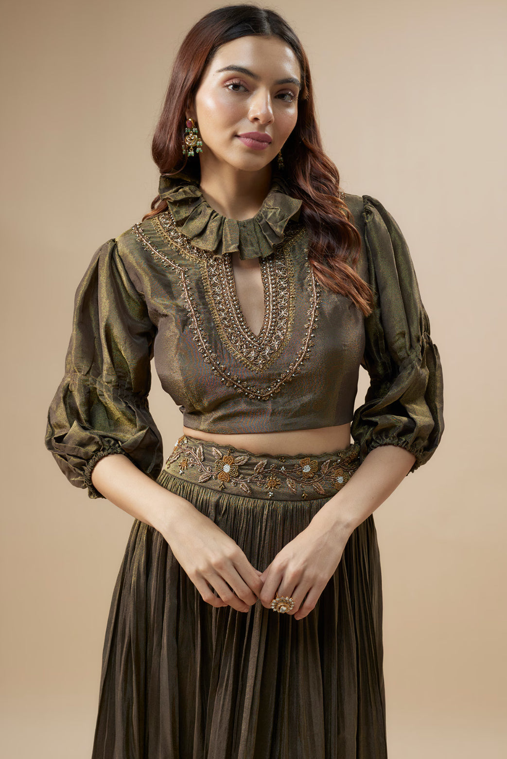 Dark green tissue crop top and pleated pants