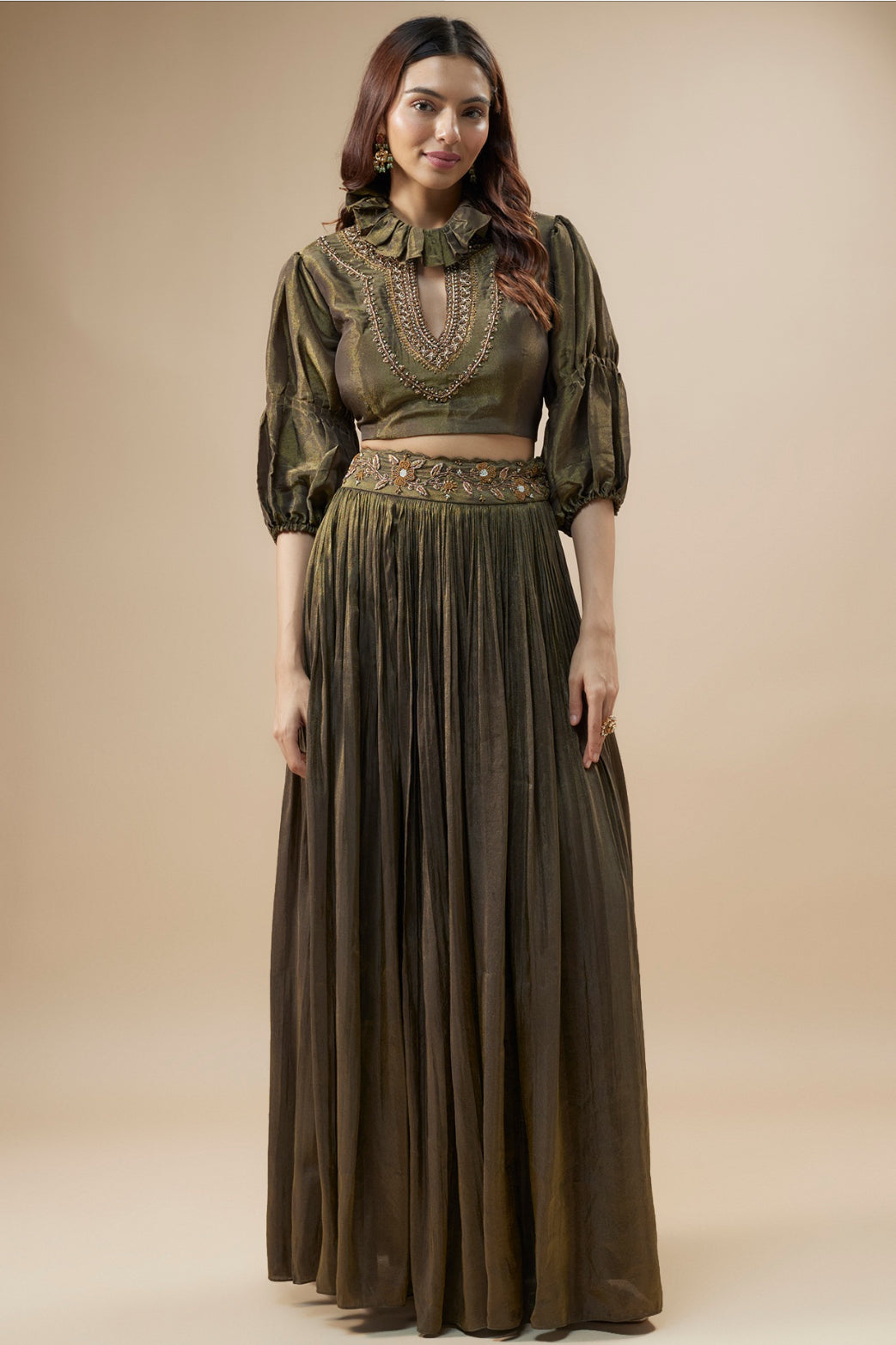 Dark green tissue crop top and pleated pants