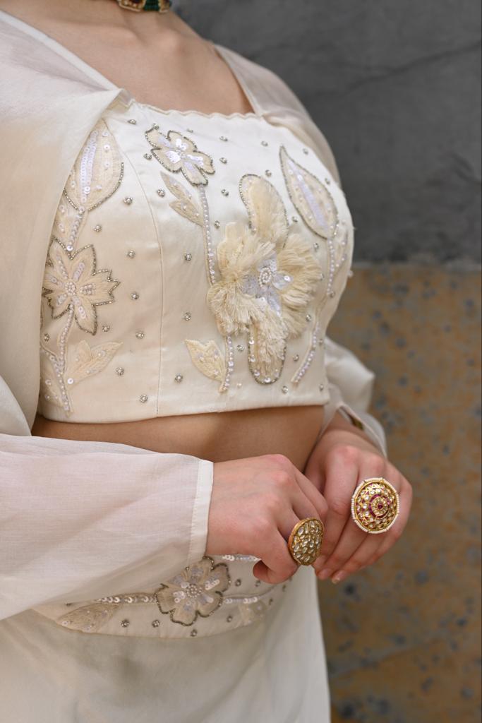 Off White Lehenga Blouse With Embroidered Floral Border And Cutdana Bu –  Akashi designer studio