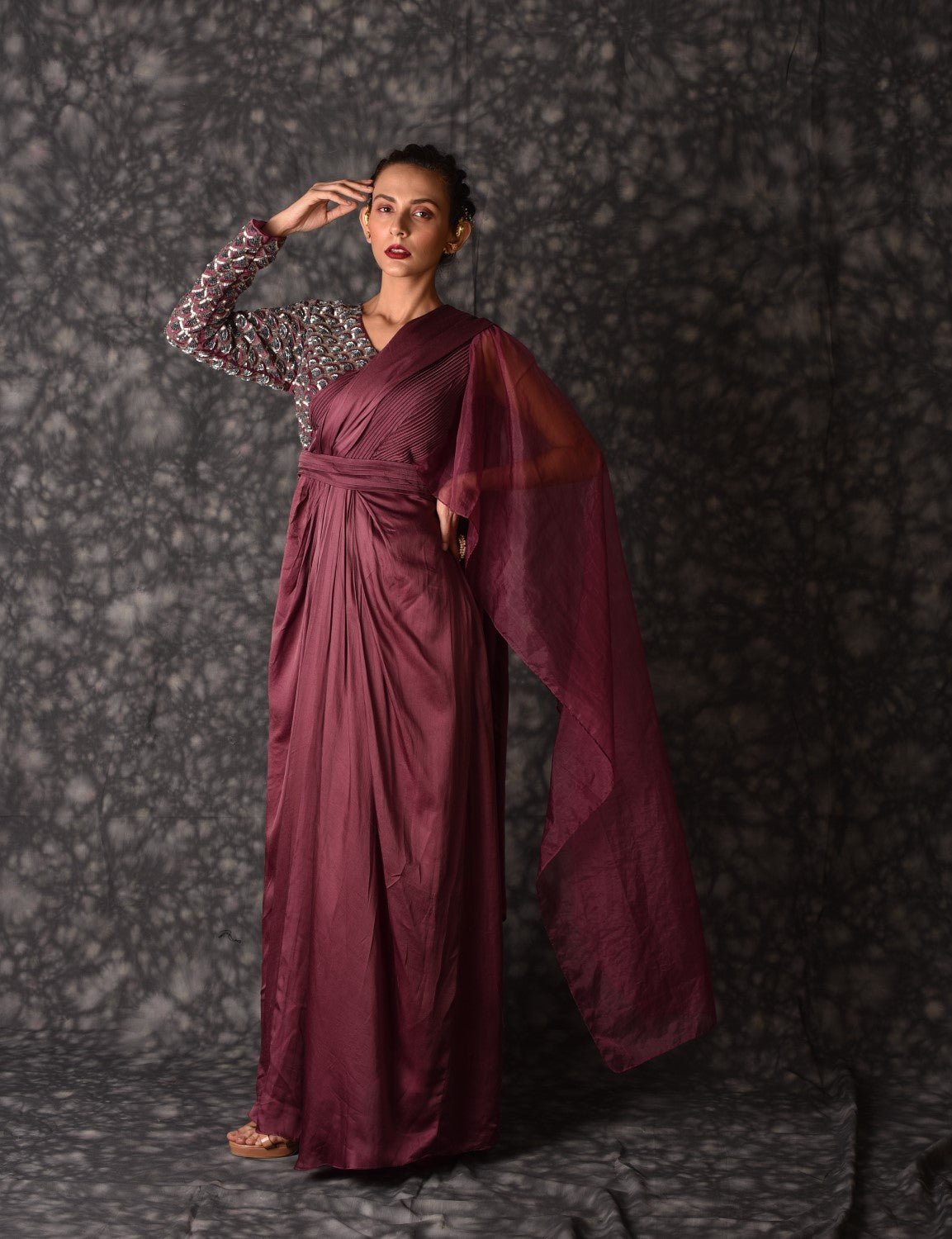 Wine embellished draped gown