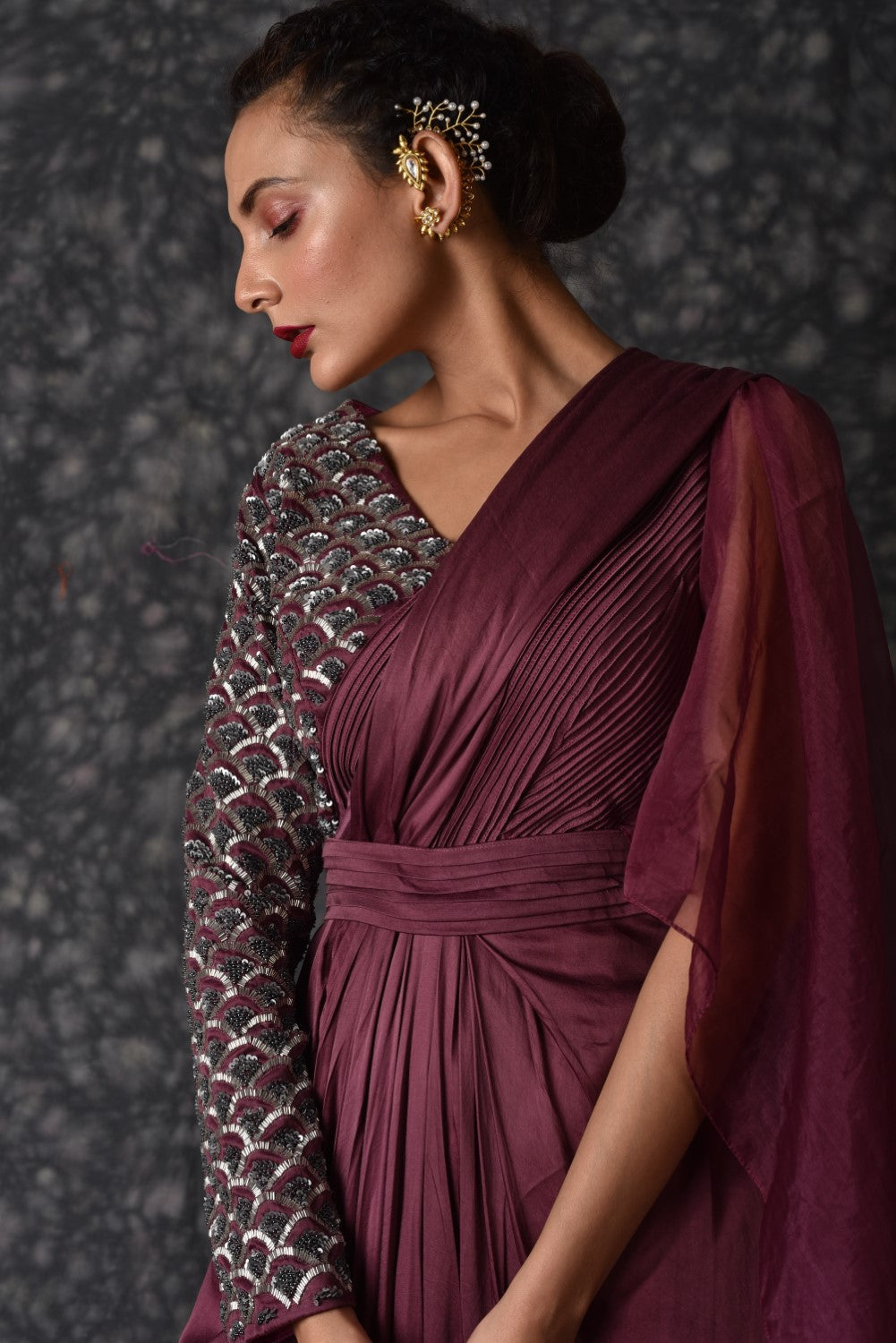 Wine embellished draped gown