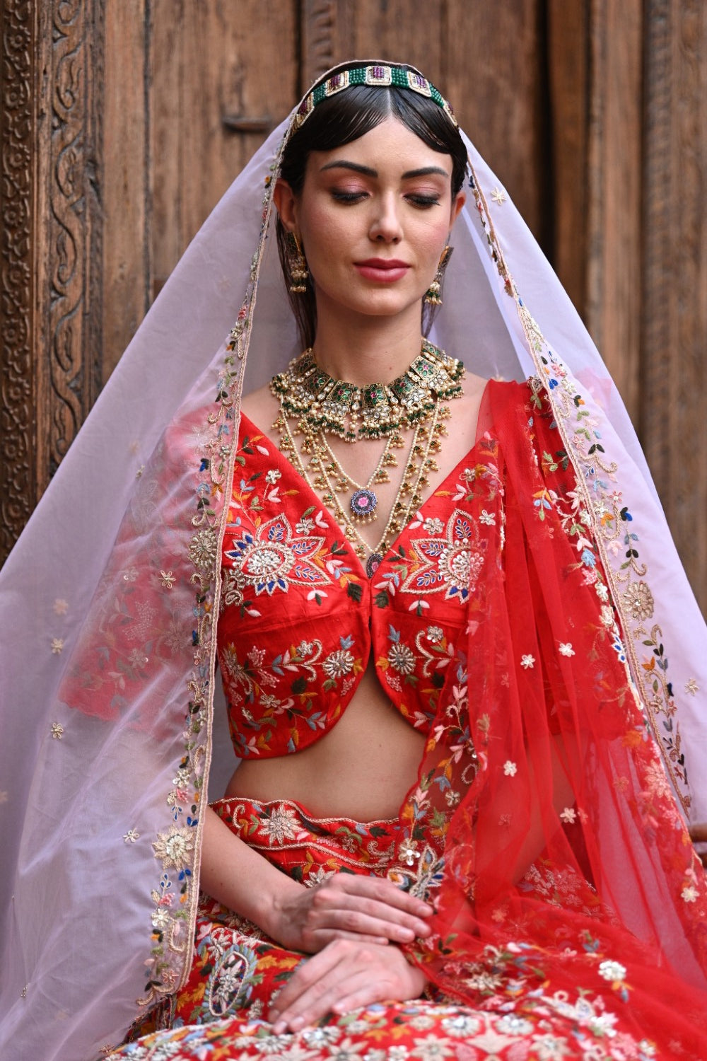 Red peacock embroidered bridal lehenga set